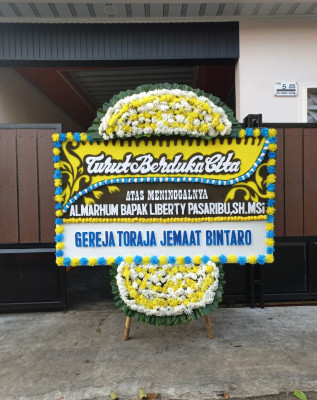 Papan Bunga Duka di Sungai Serut